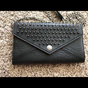 Chained leather clutch